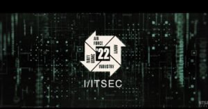 IITSEC logo inside dark navy star background