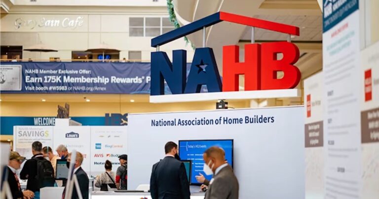 crowd standing in front of an NAHB sign at the International Builders Show